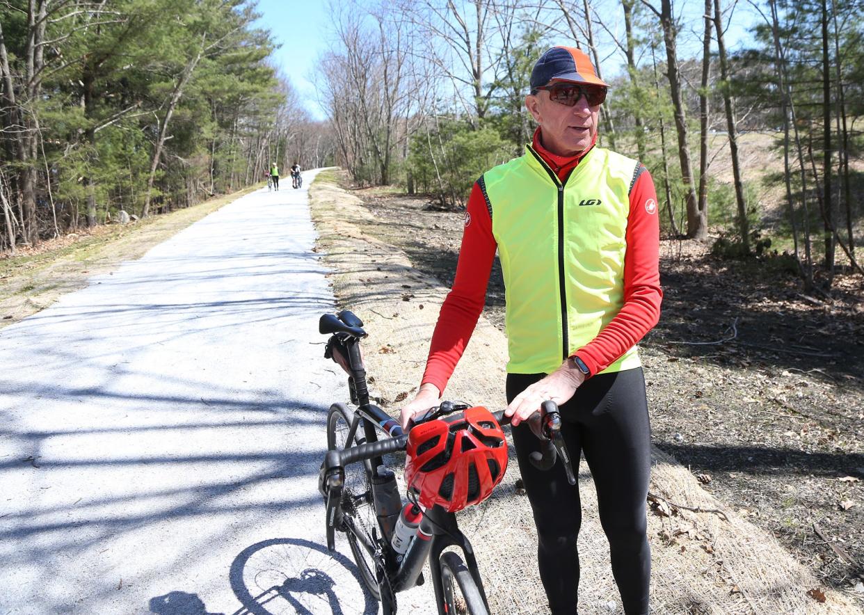 Seacoast Greenway Alliance board member and former Portsmouth deputy city manager Dave Allen gets ready to ride his bike on a stretch of the New Hampshire Seacoast Greenway April 23, 2024.