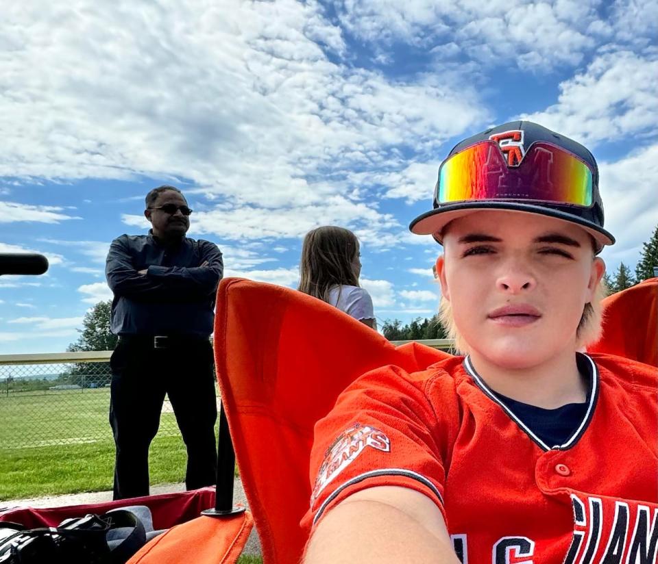 Oil Giants team member, Chance Croucher, taking a selfie with driver Nadeem Aslam during Sunday's game.