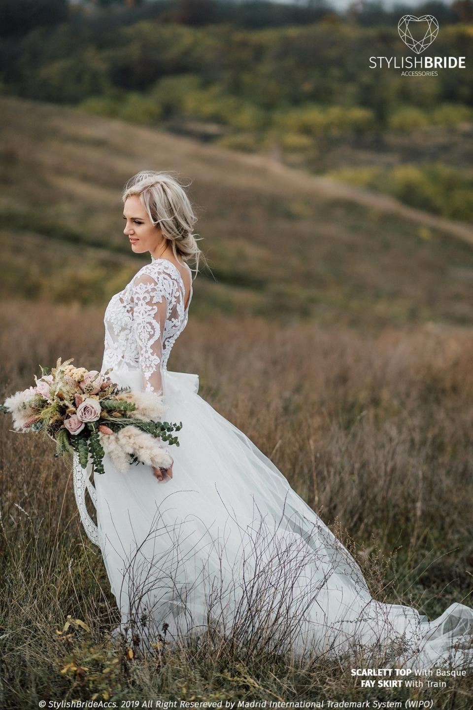 This bridal shop has a lot of dresses with&nbsp;delicate, sheer details and over 1,000 reviews. <strong><a href="https://fave.co/2BJcF3W" target="_blank" rel="noopener noreferrer">Check it out.</a></strong>