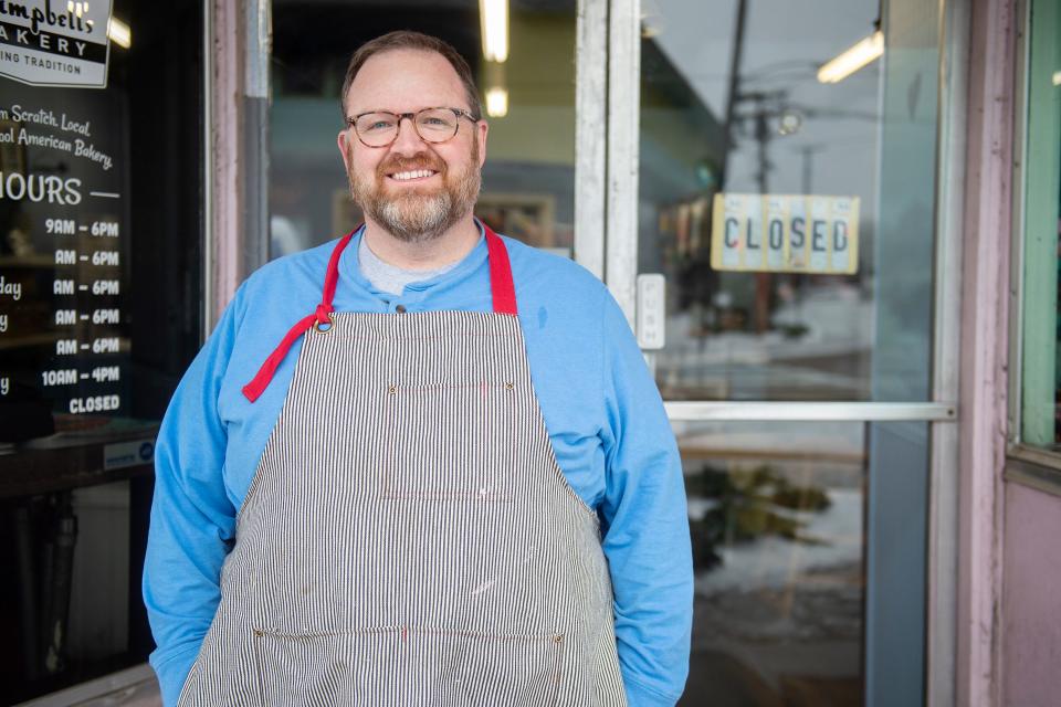 Mitchell Moore, owner of Campbell's Bakery, poses for his portrait outside of his bakery on North State Street in Jackson, Miss., Thursday, Feb. 18, 2021.