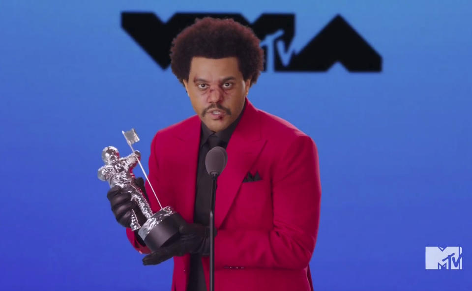 In this video grab issued Sunday, Aug. 30, 2020, by MTV, The Weeknd accepts the video of the year award for "Blinding Lights" during the MTV Video Music Awards. (MTV via AP)