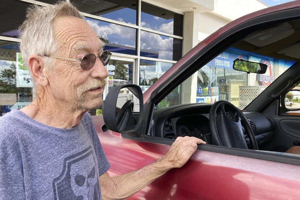 James Martin discusses his hesitancy to get a COVID-19 vaccine while stopping at a store in Clanton, Ala., on Wednesday, May 19, 2021. Martin said he doesn’t trust the vaccines because of the speed with which they were developed and a lack of knowledge about long-term effects. (AP Photo/Jay Reeves)