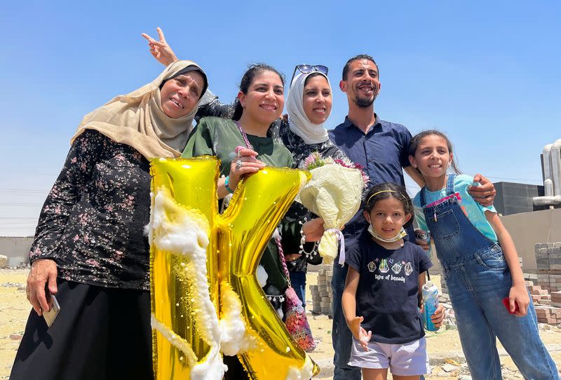 FILE PHOTO: Kholoud Saied, one of a group of newly released detainees, celebrates with her family and friends after leaving Tora prison in a suburb of Cairo