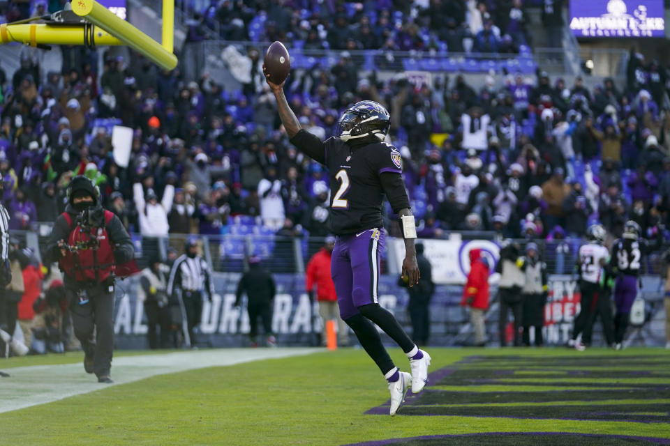 Baltimore Ravens quarterback Tyler Huntley (2) celebrates his 2-point conversion during the first half of an NFL football game against the Atlanta Falcons, Saturday, Dec. 24, 2022, in Baltimore. (AP Photo/Julio Cortez)