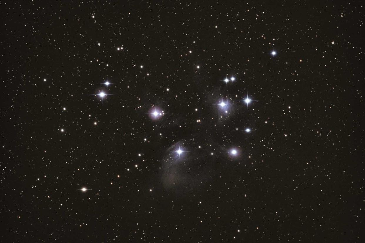 The stars cluster The Pleiades, M45 (Messier 45) taken from France and viewed like in binoculars. M45 is in the constellation of Taurus.