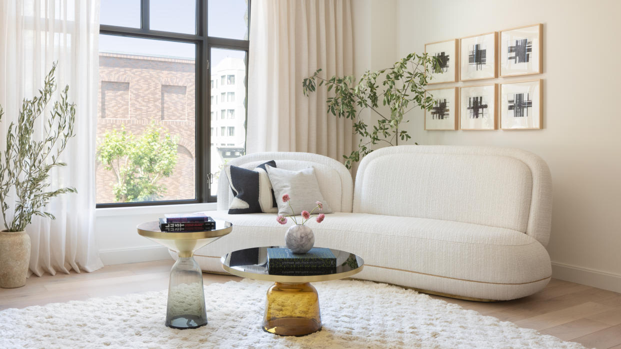  Cream living room with sheer curtains 