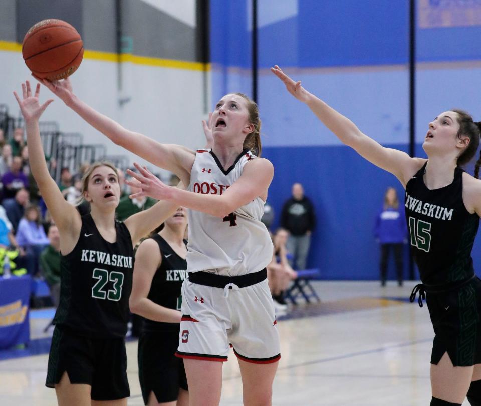 Oostburg’s Riley Ketterhagen (4) is one of the 14 girls basketball players to watch in the Manitowoc and Sheboygan areas.