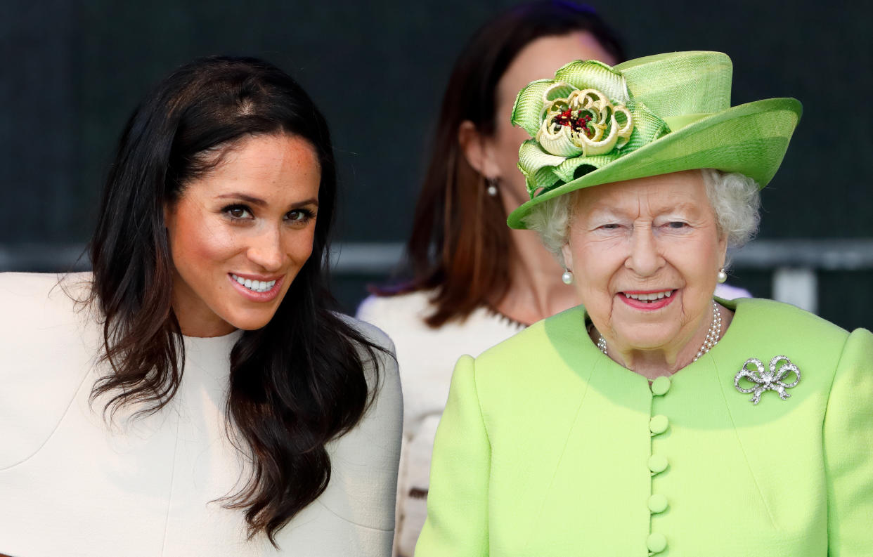 WIDNES, UNITED KINGDOM - JUNE 14: (EMBARGOED FOR PUBLICATION IN UK NEWSPAPERS UNTIL 24 HOURS AFTER CREATE DATE AND TIME) Meghan, Duchess of Sussex and Queen Elizabeth II attend a ceremony to open the new Mersey Gateway Bridge on June 14, 2018 in Widnes, England. Meghan Markle married Prince Harry last month to become The Duchess of Sussex and this is her first engagement with the Queen. During the visit the pair will open a road bridge in Widnes and visit The Storyhouse and Town Hall in Chester. (Photo by Max Mumby/Indigo/Getty Images)