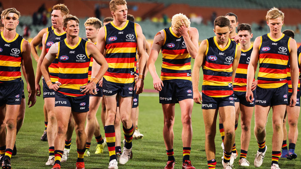 Adelaide Crows players, pictured here after their loss to Melbourne.