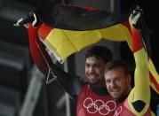 Luge – Pyeongchang 2018 Winter Olympics – Men’s Doubles competition – Olympic Sliding Centre - Pyeongchang, South Korea – February 14, 2018 - Tobias Wendl and Tobias Arlt of Germany celebrate winning gold. REUTERS/Edgar Su