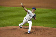 Kansas City Royals starting pitcher Jonathan Heasley throws during the second inning of a baseball game against the Seattle Mariners Friday, Sept. 17, 2021, in Kansas City, Mo. (AP Photo/Charlie Riedel)