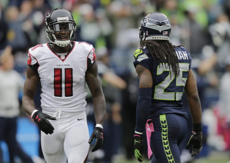 Julio Jones and Richard Sherman will meet again, on Saturday at the Georgia Dome. (AP)