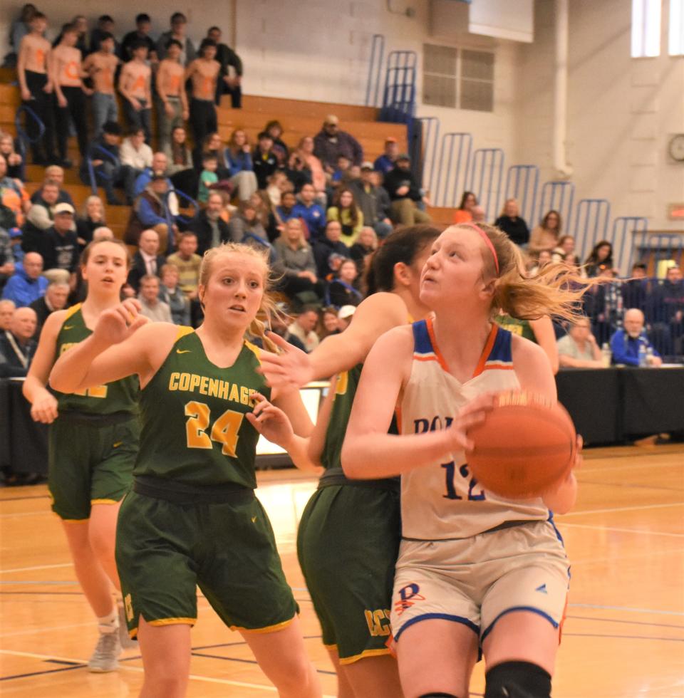 Poland Tornado Logan Cookinham prepares a shot against Copenhagen during the first half of a Section III semifinal at Allyn Hall Saturday. Cookinham broke her school's career scoring record and helped her team beat last year's Class D state champion