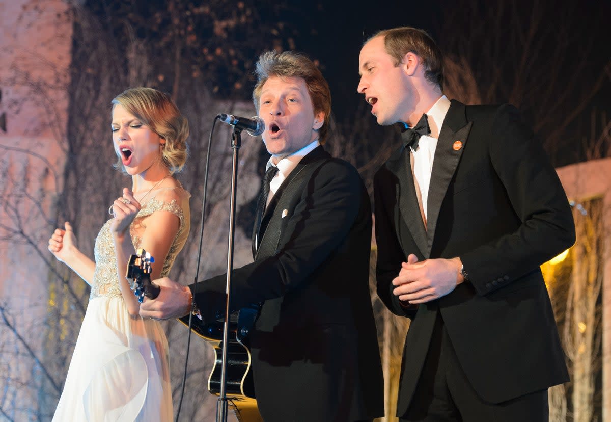 Taylor Swift, Jon Bon Jovi and Prince William on stage at Kensington Palace in London in 2013 (Getty Images)