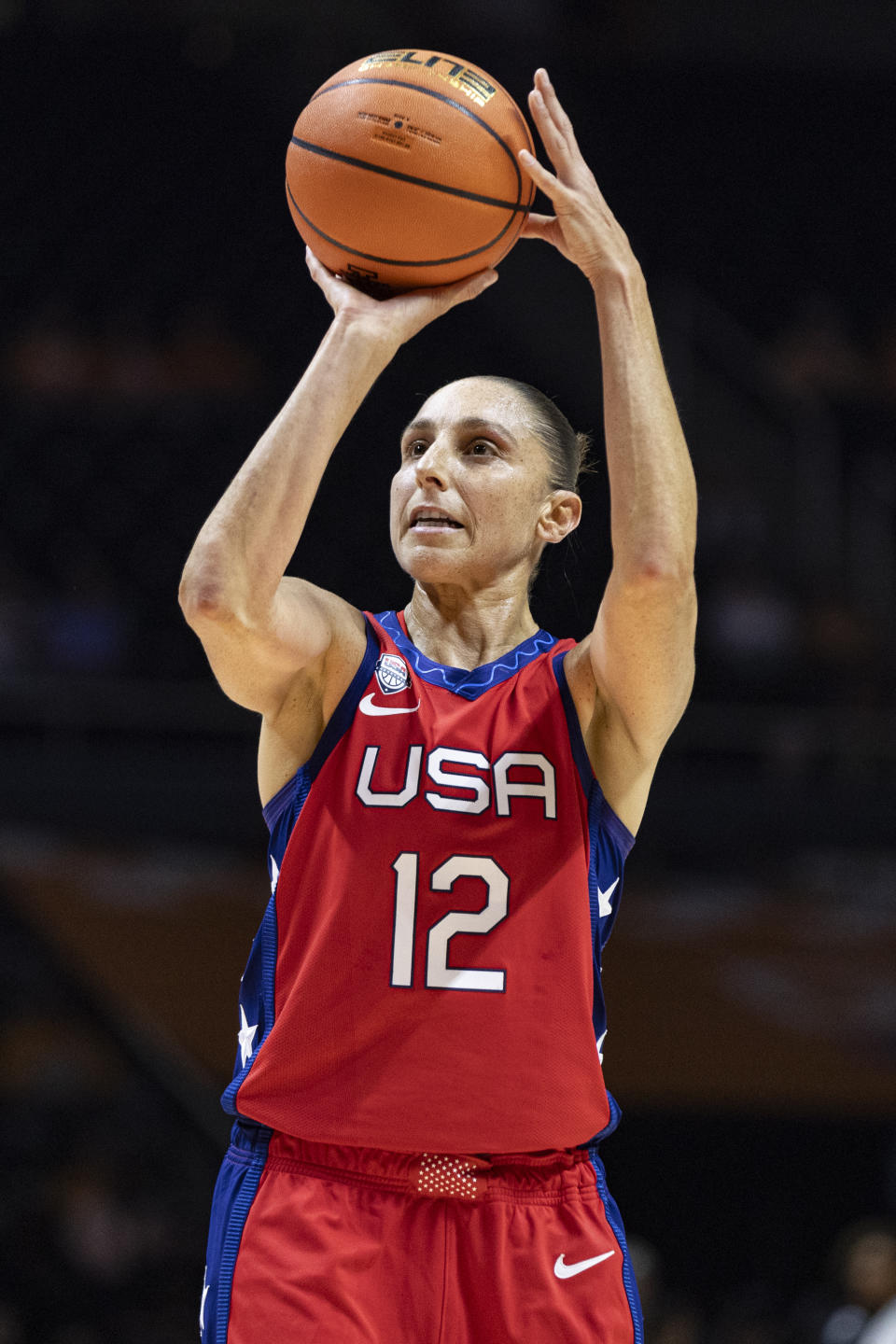 Team USA guard Diana Taurasi (12) looks to shoot a free throw during the first half of an NCAA college basketball exhibition game against Tennessee, Sunday, Nov. 5, 2023, in Knoxville, Tenn. (AP Photo/Wade Payne)