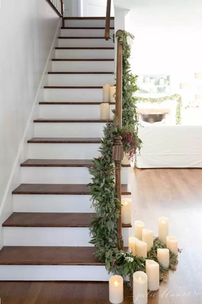 <p>Give your staircase a grand, romantic glow by adding flameless candles that will last well into the new year.</p><p><strong>See more at <a href="https://julieblanner.com/christmas-house/" rel="nofollow noopener" target="_blank" data-ylk="slk:Julie Blanner;elm:context_link;itc:0;sec:content-canvas" class="link ">Julie Blanner</a>.</strong></p><p><strong><a class="link " href="https://www.amazon.com/Antizer-Flameless-Candles-Battery-Remote/dp/B07D26KQZ7/ref=sr_1_4?tag=syn-yahoo-20&ascsubtag=%5Bartid%7C10050.g.23362967%5Bsrc%7Cyahoo-us" rel="nofollow noopener" target="_blank" data-ylk="slk:SHOP FLAMELESS CANDLES;elm:context_link;itc:0;sec:content-canvas">SHOP FLAMELESS CANDLES</a><br></strong></p>