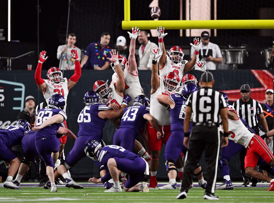 Utah players try to block an extra point as they and Northwestern play in the SRS Distribution Las Vegas Bowl at Allegiant Stadium on Saturday, Dec. 23, 2023. Northwestern won 14-7. | Scott G Winterton, Deseret News