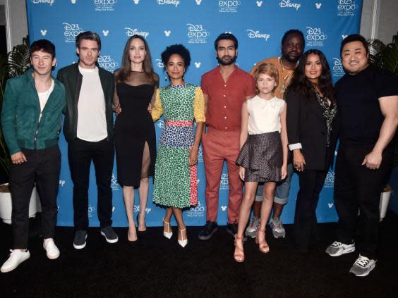 Barry Keoghan, Richard Madden, Angelina Jolie, Lauren Ridloff, Kumail Nanjiani, Lia McHugh, Brian Tyree Henry, Salma Hayek, and Don Lee of Eternals at D23 this weekend (Alberto E. Rodriguez/Getty Images for Disney)