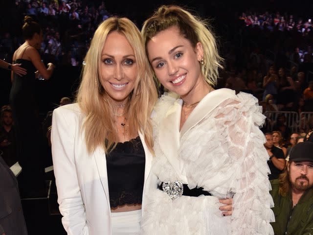 <p>Kevin Mazur/BBMA2017/Getty</p> Tish Cyrus and Miley Cyrus attend the Billboard Music Awards in Las Vegas in May 2017