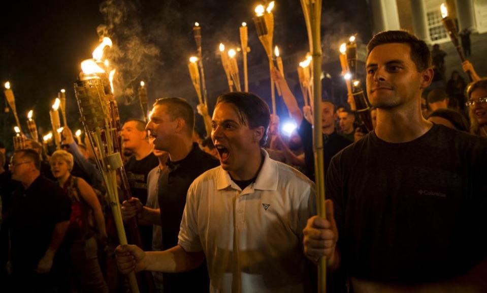 Neo-Nazis and white supremacists at the University of Virginia after marching through the campus with torches in Charlottesville, Virginia, in August 2017.