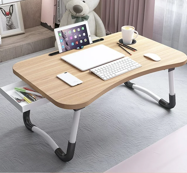<p><a href="https://go.redirectingat.com?id=74968X1596630&url=https%3A%2F%2Fwww.walmart.com%2Fip%2FPHANCIR-Foldable-Lap-Desk-23-6-Inch-Portable-Wood-Laptop-Desk-Table-Workspace-Organizer-Bed-Tray-iPad-Slots-Cup-Holder-Drawer-Anit-Slip-Working-Readi%2F2966718076&sref=https%3A%2F%2Fwww.countryliving.com%2Fshopping%2Fg45485422%2Fwalmart-deals-holiday-kickoff-sale-2023%2F" rel="nofollow noopener" target="_blank" data-ylk="slk:Shop Now;elm:context_link;itc:0;sec:content-canvas" class="link ">Shop Now</a></p><p>Foldable Lap Desk</p><p>$17.99</p>