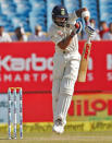 Cricket - India v England - First Test cricket match - Saurashtra Cricket Association Stadium, Rajkot, India - 12/11/16. India's Virat Kohli plays a shot. REUTERS/Amit Dave