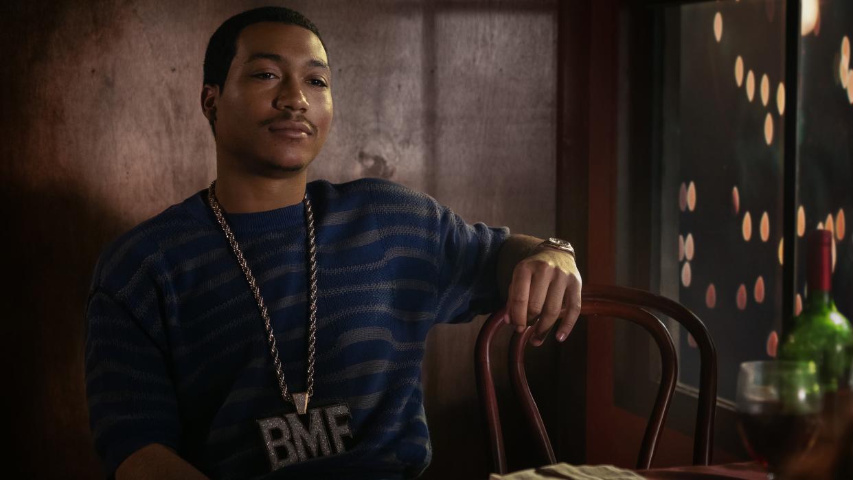  Demetrius "Lil Meech" Flenory Jr. as Big Meech smirking in BMF season 3 . 