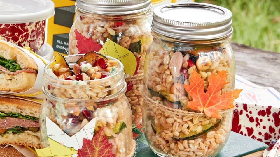 farro and acorn squash salad in mason jars at a picnic