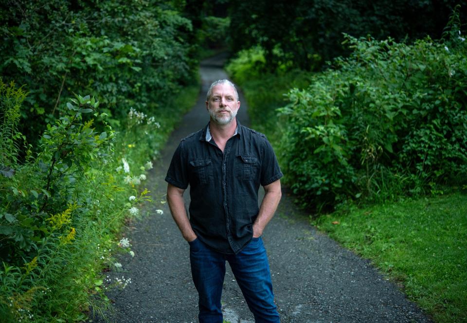 LEOMINSTER - Ronny Le Blanc in woods near his Leominster home Thursday, August 17, 2023.