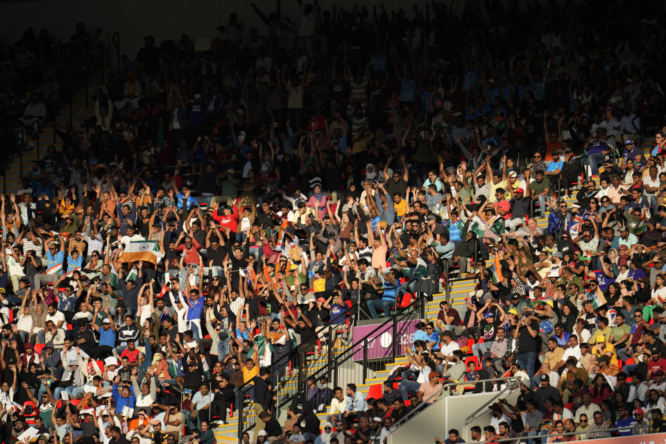 Supporters of India cheer for their team during the Asian Cup Group B soccer match between Australia and India at Ahmad Bin Ali Stadium in Doha, Qatar, Saturday, Jan. 13, 2024. (AP Photo/Aijaz Rahi)