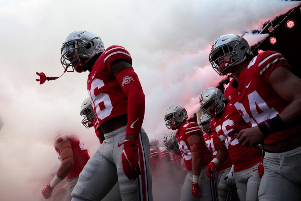 Ohio State Buckeyes players take the field at the start of a NCAA Division I football game between the Ohio State Buckeyes and the Maryland Terrapins on Saturday, Oct. 9, 2021 at Ohio Stadium in Columbus, Ohio.