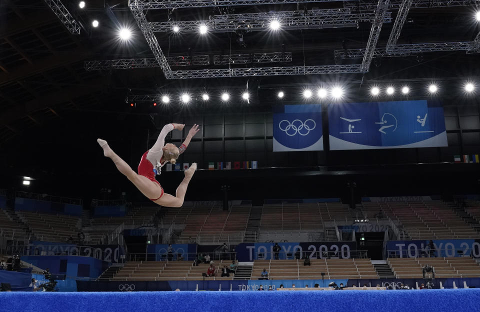 Angelina Melnikova, of the Russian Olympic Committee, performs her floor exercise during the women's artistic gymnastic qualifications at the 2020 Summer Olympics, Sunday, July 25, 2021, in Tokyo. (AP Photo/Ashley Landis)