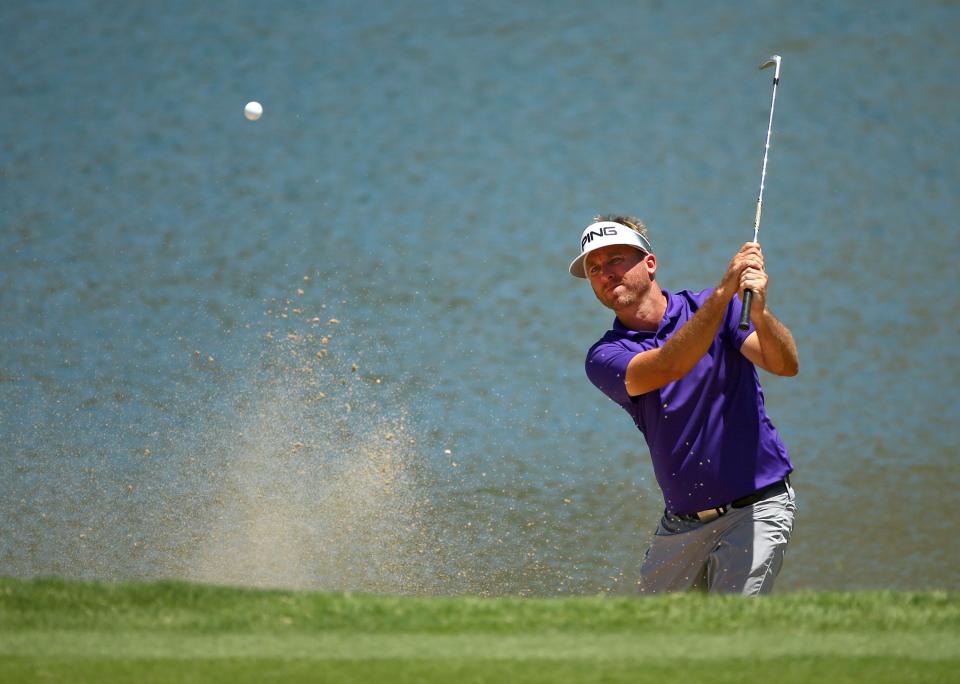 Jesse Mueller of Phoenix blasts out of a bunker on the 18th hole during the final round of the 77th Arizona Open played at Superstition Mountain Golf and Country Club on Aug. 5, 2020.