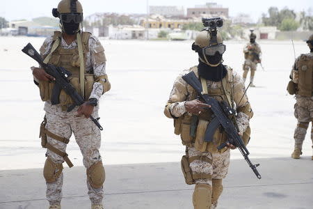 A Saudi soldier secure the international airport of Yemen's southern port city of Aden July 24, 2015. REUTERS/Faisal Al Nasser