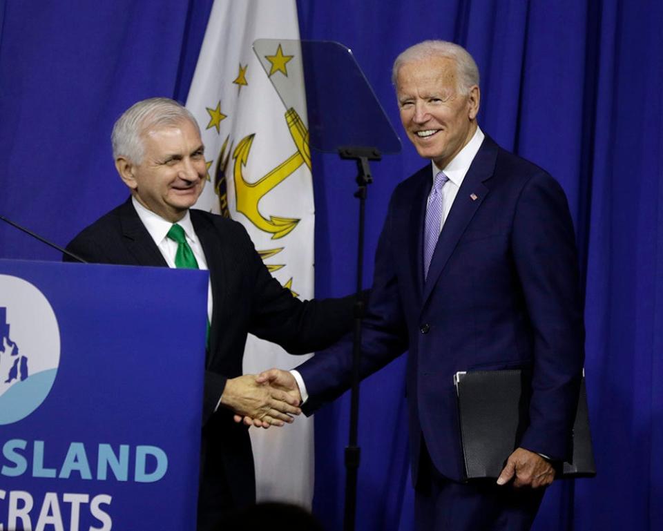 Joe Biden, at the time a former senator and former vice-president, is introduced by Sen. Jack Reed at a 2018 rally for Rhode Island Democrats.