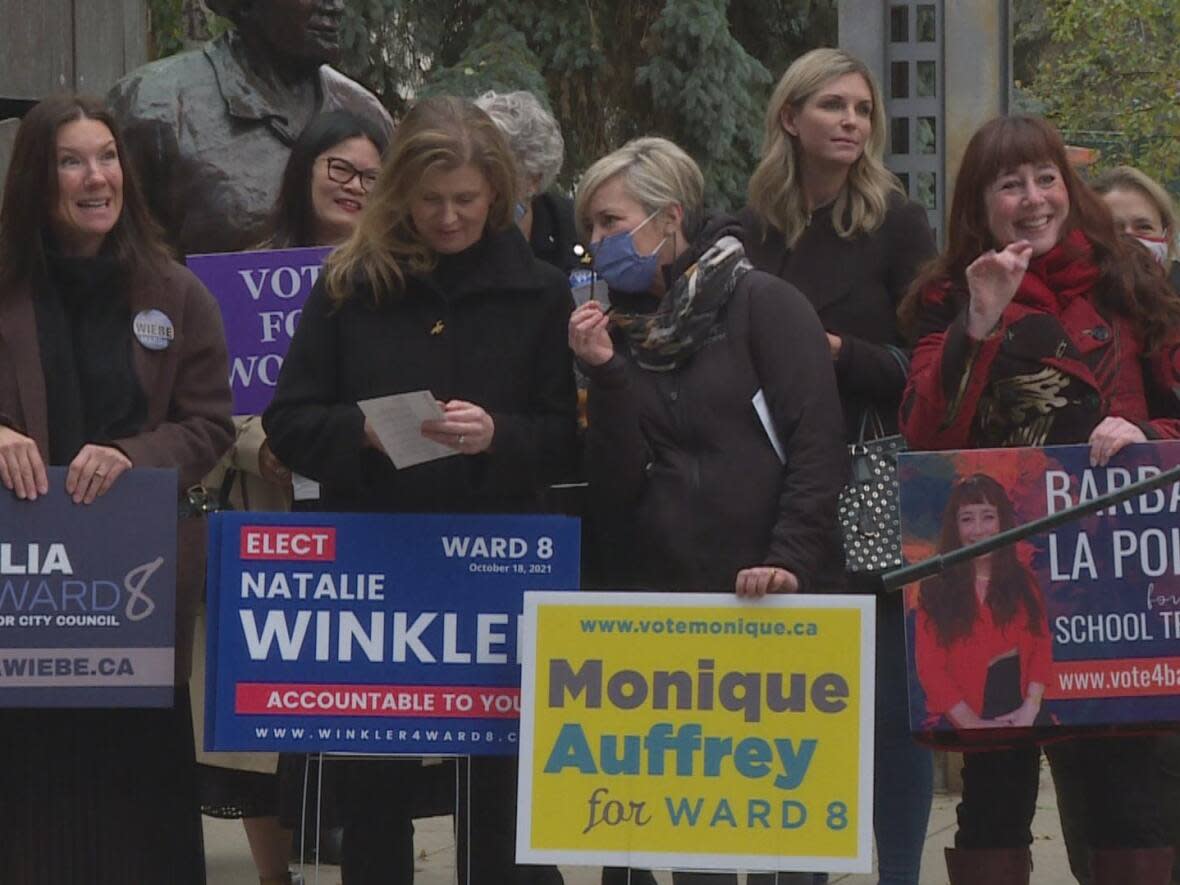 Candidates in this year's municipal election attended a rally in support of the women running in downtown Calgary Friday.   (Dave Gilson/CBC - image credit)