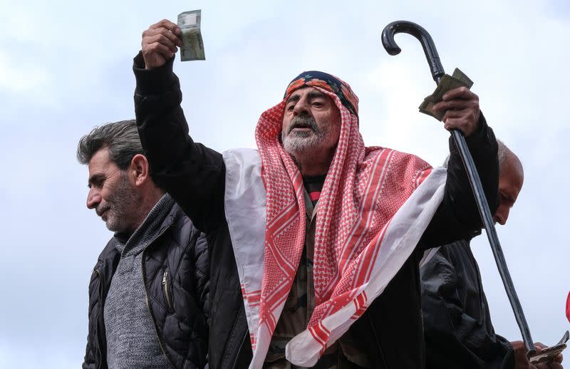 People protest over the deteriorating economic situation in Beirut