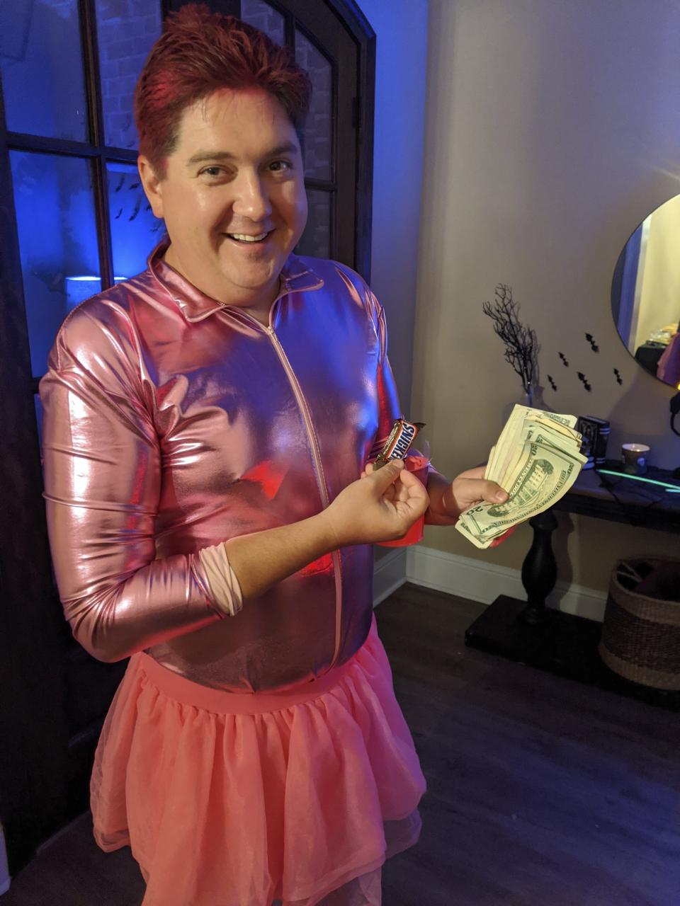 This photo provided by Melissa England shows her husband, Mississippi state Sen. Jeremy England, dressed in a Halloween costume to raise money for breast cancer research, on Oct. 31, 2020. In an interview with The Associated Press on Friday, July 21, 2023, Jeremy England said a similar photo of him in the tutu was published on social media along with a slur after he appeared in a TV ad supporting Mississippi Lt. Gov. Delbert Hosemann, who faces two challengers in the Aug. 8, 2023, Republican primary. (Melissa England via AP)