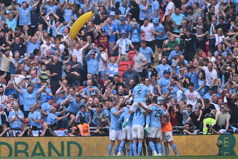 
Manchester City festejando el segundo gol del equipo (Photo by Glyn KIRK / AFP) / NOT FOR MARKETING OR ADVERTISING USE / RESTRICTED TO EDITORIAL USE