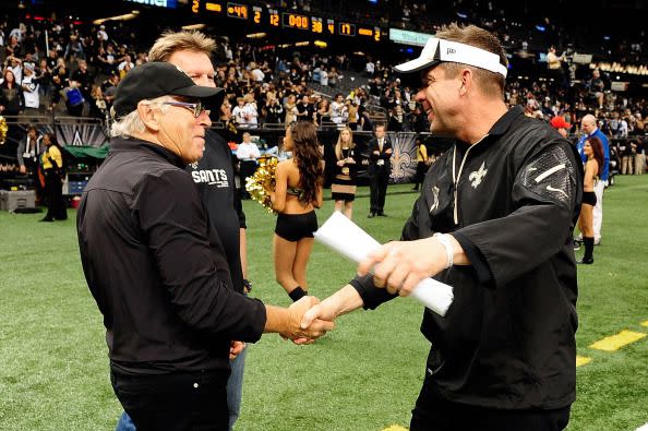 NEW ORLEANS, LA - NOVEMBER 10:  Sean Payton, head coach of the New Orleans Saints, greets musician Jimmy Buffett following a game against the Dallas Cowboys at the Mercedes-Benz Superdome on November 10, 2013 in New Orleans, Louisiana.  New Orleans defeated Dallas 49-17.  (Photo by Stacy Revere/Getty Images)