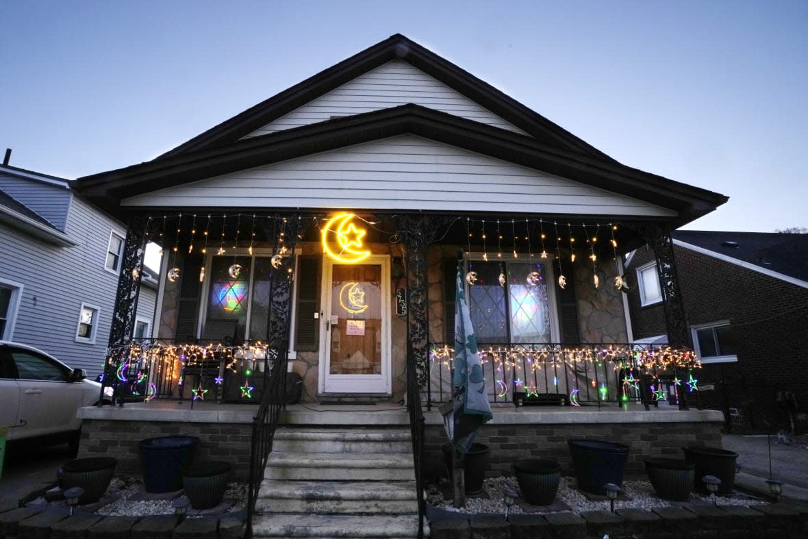 A house is decorated for Ramadan in Dearborn, Mich., on Wednesday, March 29, 2023. More businesses are selling Ramadan and Eid items, including DIY kits, lanterns and napkin holders. It’s one of the latest signs of big U.S. retailers catering to American Muslim shoppers. (AP Photo/Carlos Osorio)