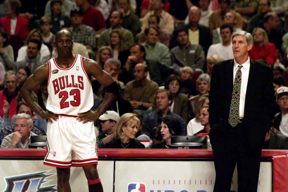 June 7, 1998; Chicago, IL, USA; Chicago Bulls guard Michael Jordan and Utah Jazz coach Jerry Sloan assess their situations during a break in play during the 1998 NBA Finals. Mandatory Credit: Robert Hanashiro-USA TODAY