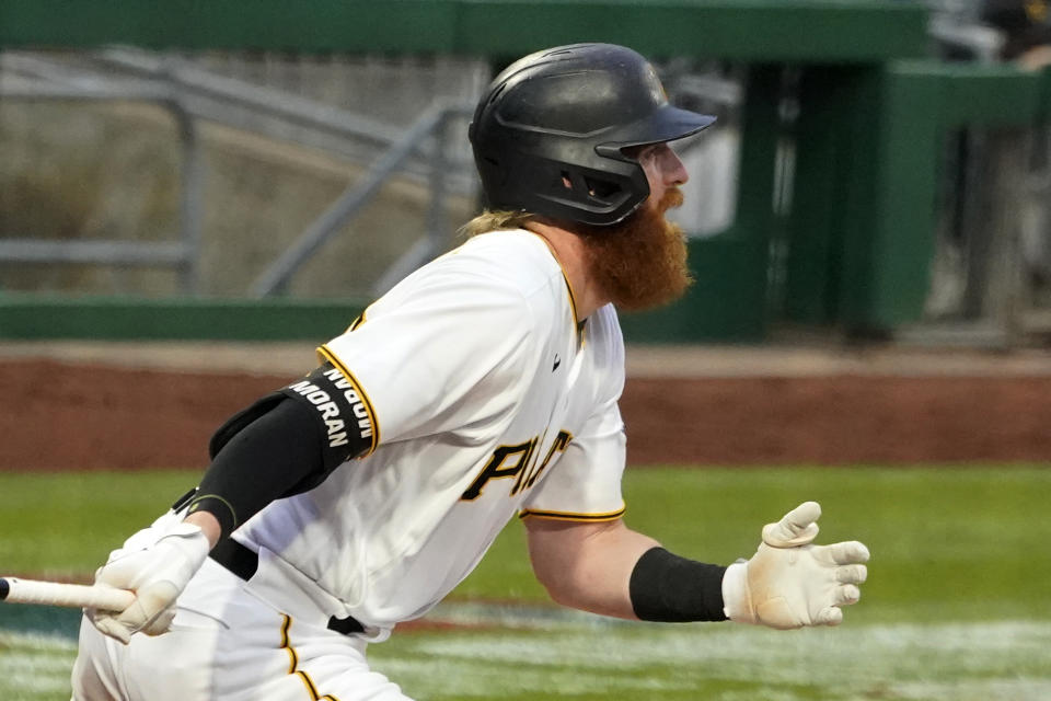 Pittsburgh Pirates' Colin Moran watches his two-run single off Chicago Cubs starting pitcher Zach Davies during the second inning of a baseball game in Pittsburgh, Saturday, April 10, 2021. (AP Photo/Gene J. Puskar)