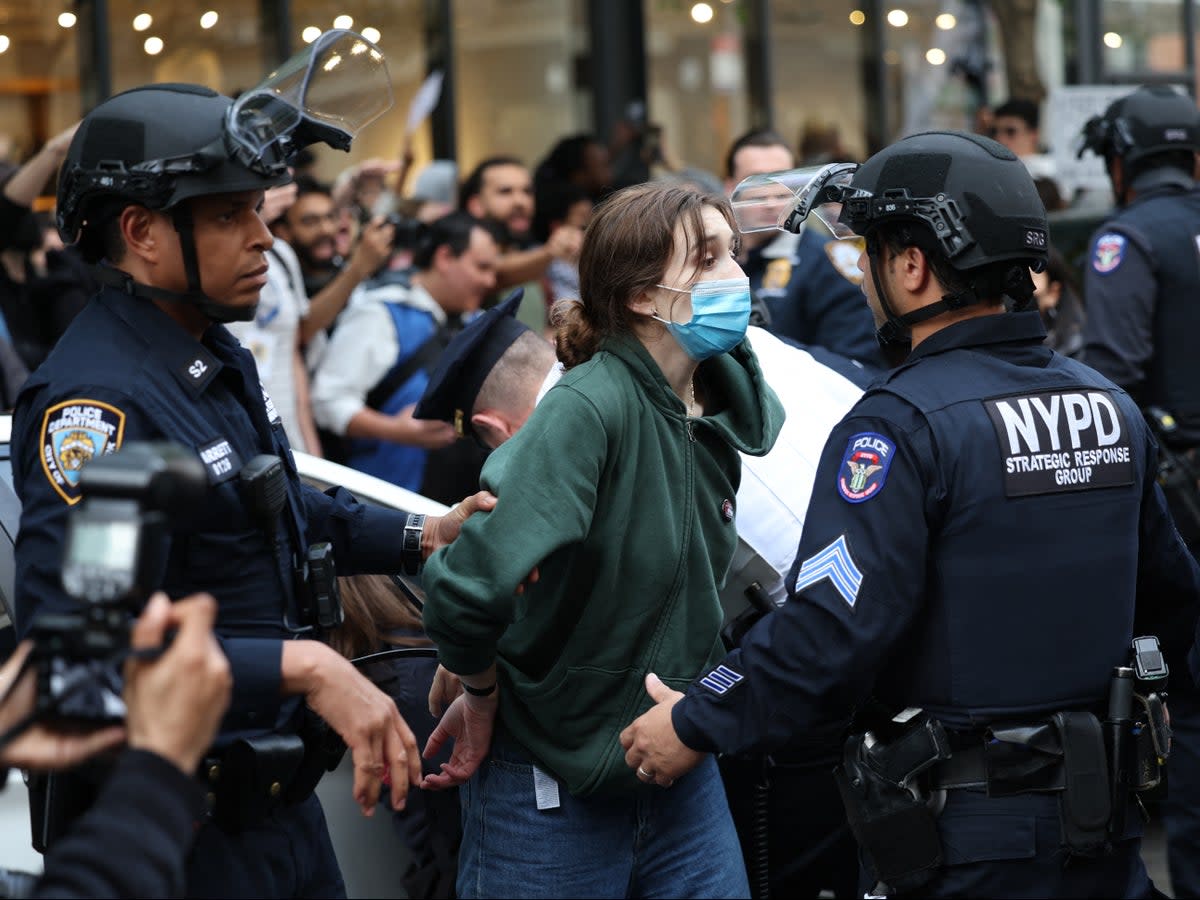 Police arrest a pro-Palestinian demonstrator near the Met Gala at the Metropolitan Museum of Art on May 6, 2024 in New York City (CHARLY TRIBALLEAU/AFP via Getty Images)