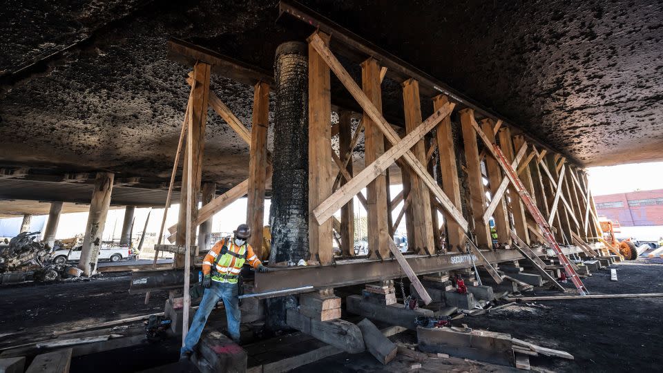 A portion of the I-10 interstate freeway in Los Angeles is indefinitely closed due to the fire. - Ted Soqui/SIPA/AP