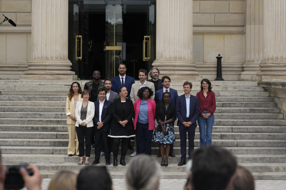 Mathilde Panot, center left, and other elected parliament members of the far-left La France Insoumise (France Unbowed) party, pose at the National Assembly, Monday, July 1, 2024 in Paris. France's National Rally surged into the lead in the first round of legislative elections, according to results released early Monday, bringing the far-right party to the brink of power and dealing a major blow to President Emmanuel Macron's centrists in an election that could set the country, and Europe, on a starkly different course. (AP Photo/Thibault Camus)