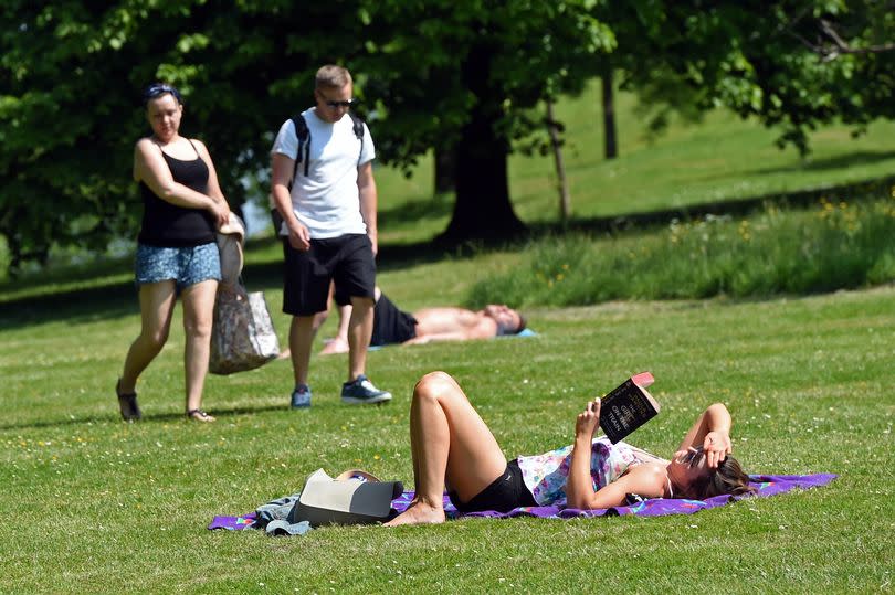 Weather pics, Sun worshippers in Glasgow's Kelvingrove park before the return of the rain tomorrow. Pic by Paul Chappells 06/06/16