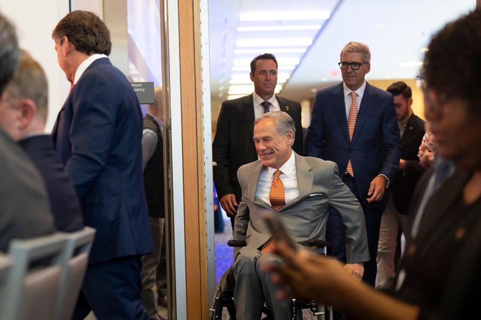 “Rather than have Texans travel to Houston, we will now be bringing the world’s best cancer care to them right here in Central Texas,” said Gov. Greg Abbott, seen arriving for the news conference Monday.
