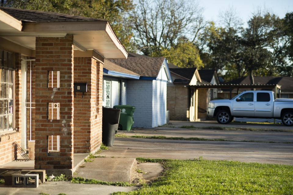 The homes on Talismans Court sit in the way of the projected Interstate 45 expansion Friday, Nov. 19, 2021, in Houston. These homes would need to be demolished if the current expansion plans go ahead. (AP Photo/Justin Rex)