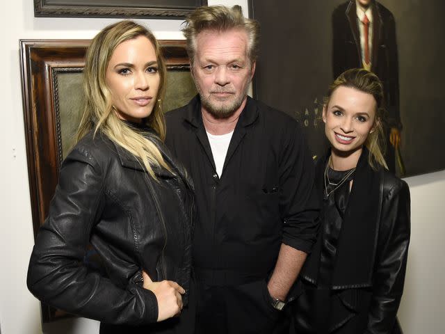 <p>Kevin Mazur/Getty </p> From left: Teddi Jo Mellencamp, John Mellencamp and Justice Mellencamp attend a private viewing of John Mellencamp's "Life, Death, Love, Freedom" on April 25, 2018 in New York City.